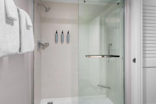 a shower with a glass door in a bathroom at Courtyard Philadelphia Valley Forge / King of Prussia in Wayne