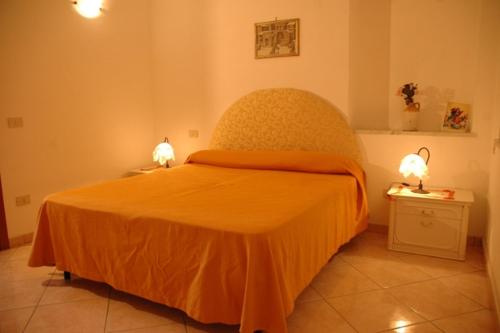 Ein Bett oder Betten in einem Zimmer der Unterkunft Case Vacanze Angiola HolidayAmalfi