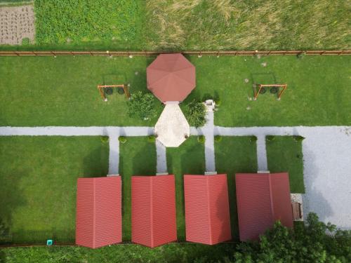 an aerial view of a park with a red stop sign at Tara Valley Eco Lounge in Mojkovac