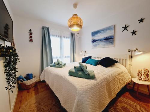 Postel nebo postele na pokoji v ubytování Cotillo Star by NicoleT