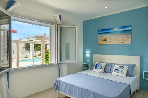 Ένα ή περισσότερα κρεβάτια σε δωμάτιο στο Private room and pool in the beach free wi-fi
