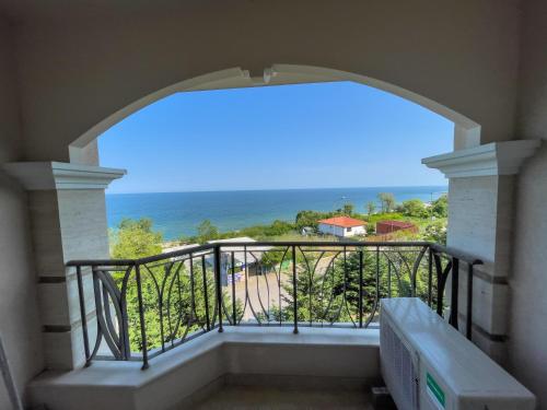 a balcony with a view of the ocean at Cabacum Beach Residence AP.19 in Varna City