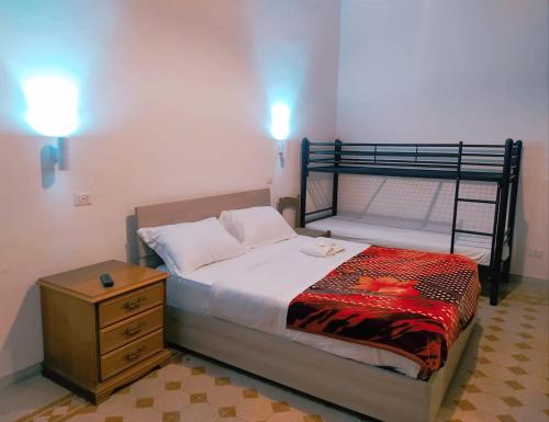 A bed or beds in a room at cattaneo accomodation