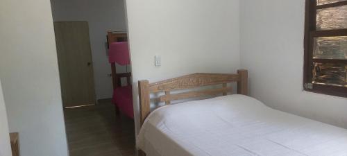 Кровать или кровати в номере Cabaña Maríamar 1