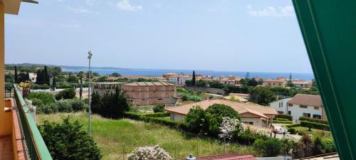 a view of a town from a window at Ferienwohnung mit Meerblick im Juwel Le Castella in Le Castella