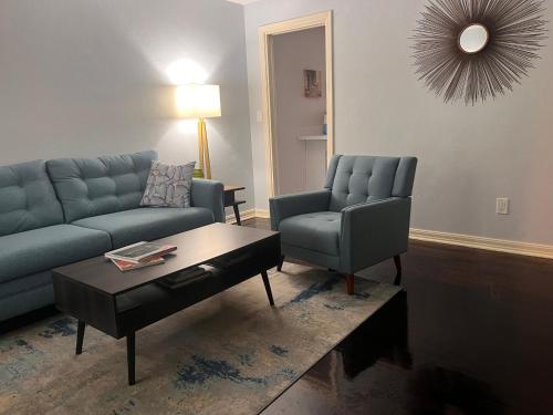 a living room with a couch and a chair at Park View West in Lakeland