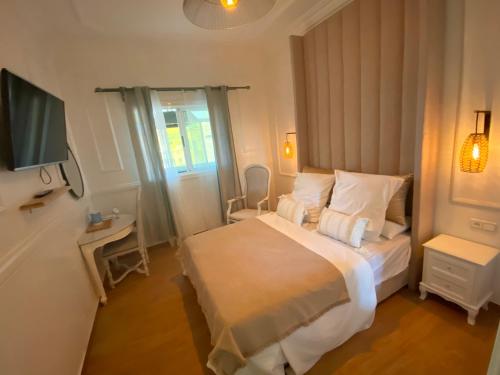 Postel nebo postele na pokoji v ubytování Appartement avec Terasse JACCUZI BARBECUE NETFLIX VUE SUR MER TOTALEMENT GRATUIT sans supplément