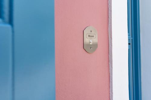 a close up of a door with a lock on it at Mosaic Luxury Home in Rhodes Town