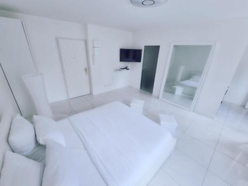 Photo de la galerie de l'établissement Le Cocon Blanc studio Jeux O, à Épinay-sur-Seine