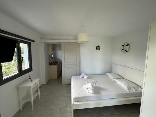 Кровать или кровати в номере La Casa Al Mare
