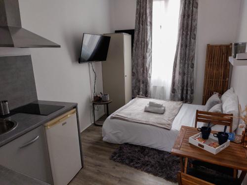Postel nebo postele na pokoji v ubytování Le Namasté