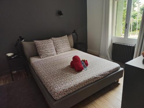 Llit o llits en una habitació de La Bastide du château