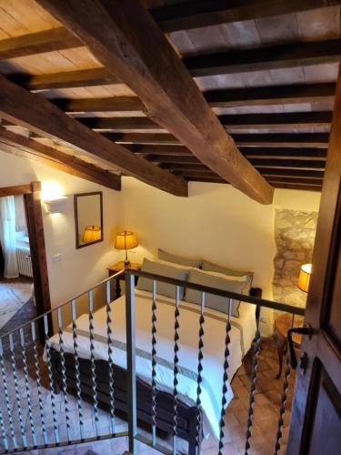 a view from the stairs of a bedroom in a house at Country House La Collina di Bargiano - Casa Raffaella in Allerona