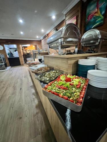 a buffet line with many different types of food at Hayde otel in Çamlıhemşin