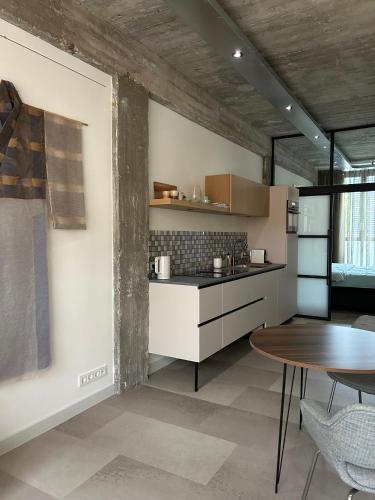 Η κουζίνα ή μικρή κουζίνα στο De Eindhovenaar City Apartments