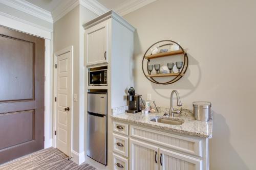 a kitchen with a sink and a refrigerator at Loretto Vacation Rental with Community Resort Perks in Loretto