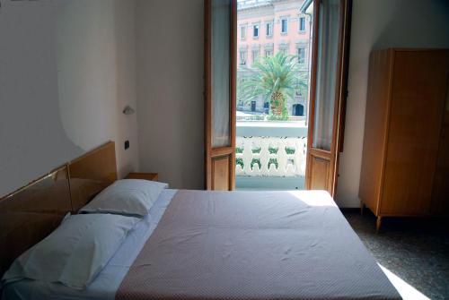 Voodi või voodid majutusasutuse Hotel Conchiglia toas