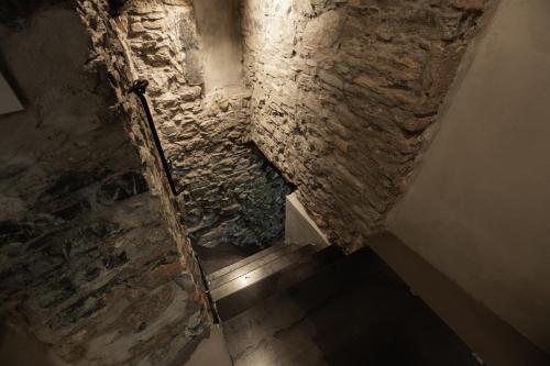 an overhead view of a stairway in a stone building at Pietralago, Casa con vista sul Lago in Blevio