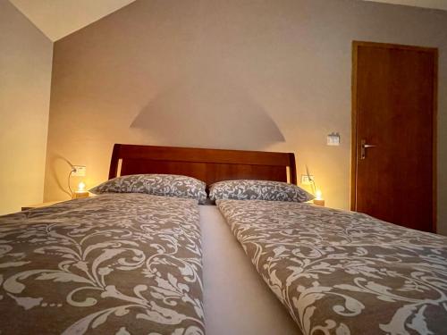 Giường trong phòng chung tại Greenwood Holiday