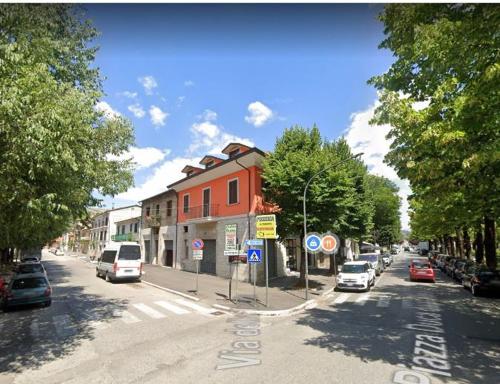 a street with cars parked on the side of the road at LB Guest House in Tagliacozzo
