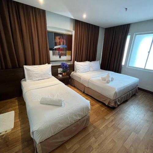 Katil atau katil-katil dalam bilik di Frenz Hotel Kuala Lumpur