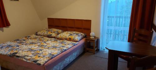 Postel nebo postele na pokoji v ubytování Ubytování Na Výsluní Tanvald