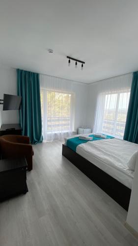 Una cama o camas en una habitación de DACHA на Магурі