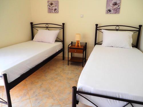 Postel nebo postele na pokoji v ubytování TSOUMAS HOUSE 1