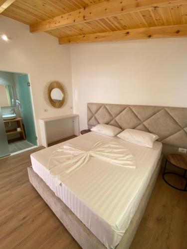 Ένα ή περισσότερα κρεβάτια σε δωμάτιο στο Hotel Andrea
