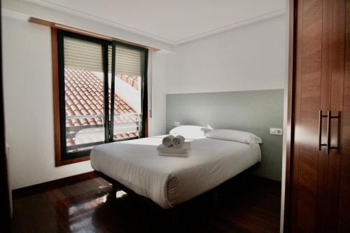 Кровать или кровати в номере 1E.Tranquilo y soleado en la Plaza de las Mercedes