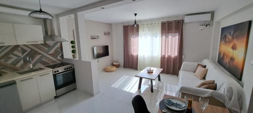 Η κουζίνα ή μικρή κουζίνα στο Xylokastro cozy apartment
