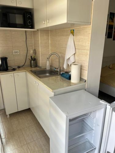 Kuchyň nebo kuchyňský kout v ubytování Complex Alfa Beta