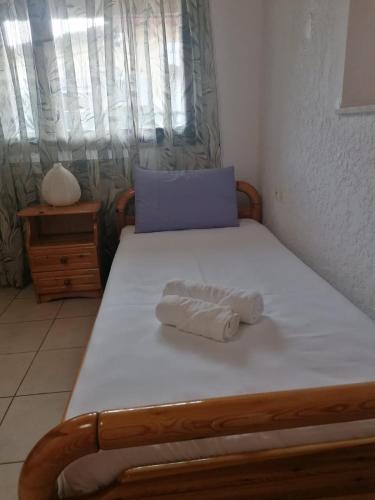 Ένα ή περισσότερα κρεβάτια σε δωμάτιο στο Tota's Family House