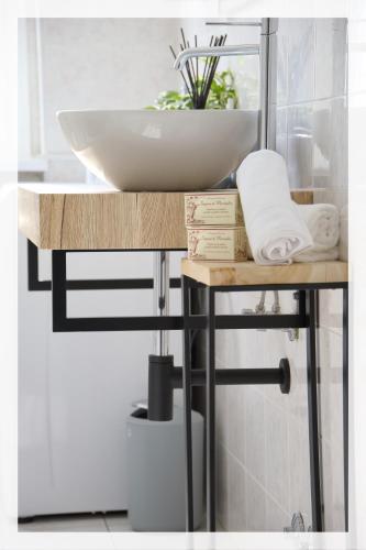 a bathroom with a counter with a sink on it at Your Place By The Lake - near Leonardo Academy, MXP in Sesto Calende