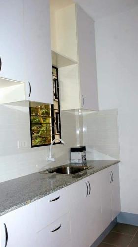Kuchyň nebo kuchyňský kout v ubytování CAP Apartments