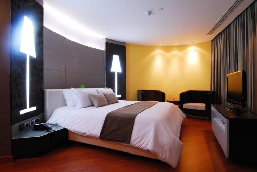 The Zign Hotelにあるベッド