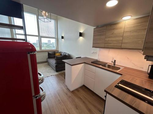 Kuchyň nebo kuchyňský kout v ubytování Stylish&Cozy Loft Žuvėdra near City Center