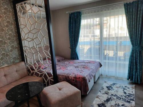 Postel nebo postele na pokoji v ubytování Apartman Alanya-Kargicak