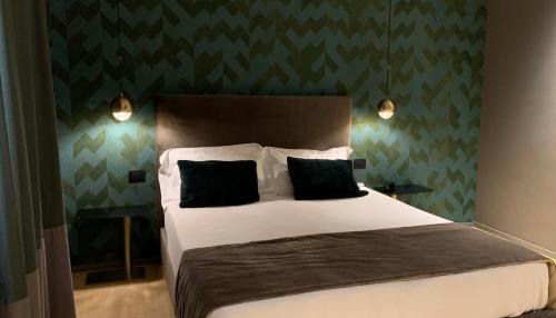 Ένα ή περισσότερα κρεβάτια σε δωμάτιο στο Re Sale Boutique Hotel
