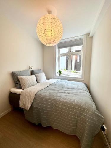 Postel nebo postele na pokoji v ubytování Knøsesmauet Apartment