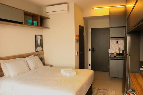 Ένα ή περισσότερα κρεβάτια σε δωμάτιο στο Apartamento Palmeiras