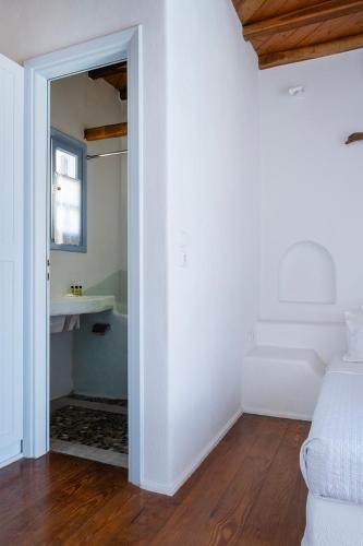 Ένα ή περισσότερα κρεβάτια σε δωμάτιο στο Nama Villas 