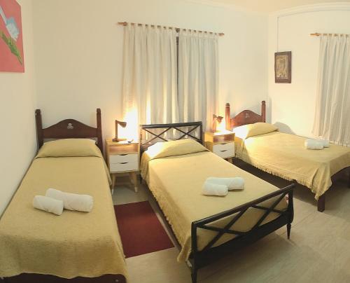 เตียงในห้องที่ Las Tejuelas - B&B Patagónico