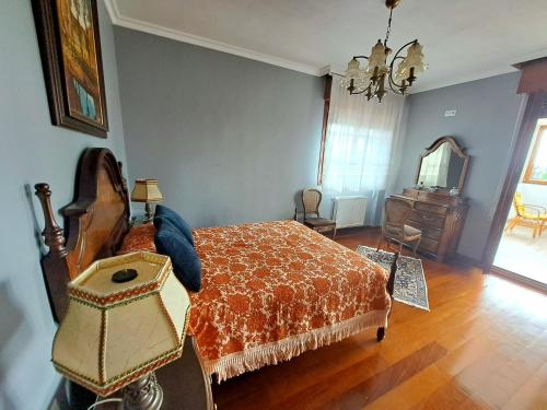 Letto o letti in una camera di Casa Chalet, Villa Elisa