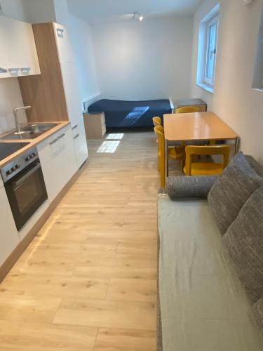 Kuchyň nebo kuchyňský kout v ubytování Apartment S&A