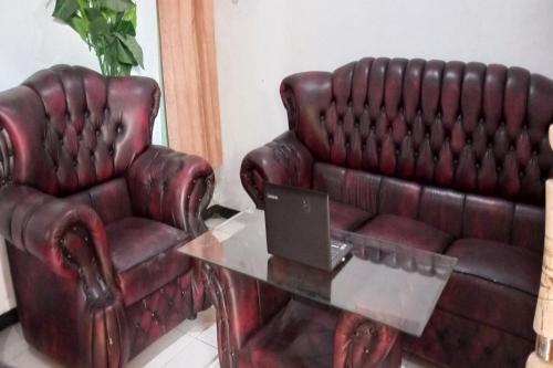 Χώρος καθιστικού στο Hotel O Kost Elisabeth Syariah
