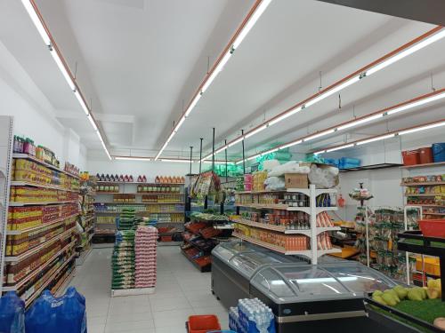 a grocery store aisle with a lot of products at Aisy Homestay Putrajaya Cyberjaya KLIA in Kampung Dengkil