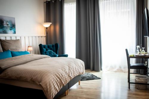 Ένα ή περισσότερα κρεβάτια σε δωμάτιο στο Modernes Apartment