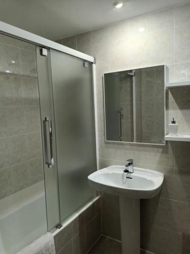 Koupelna v ubytování HOTEL FAMILIAR MAXIMINA