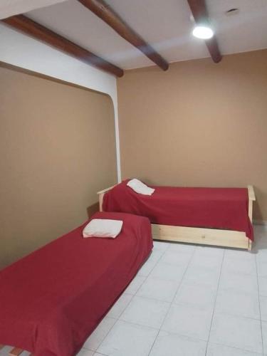 Ένα ή περισσότερα κρεβάτια σε δωμάτιο στο ALOJAMIENTO "Las Magnolias" 1 PB